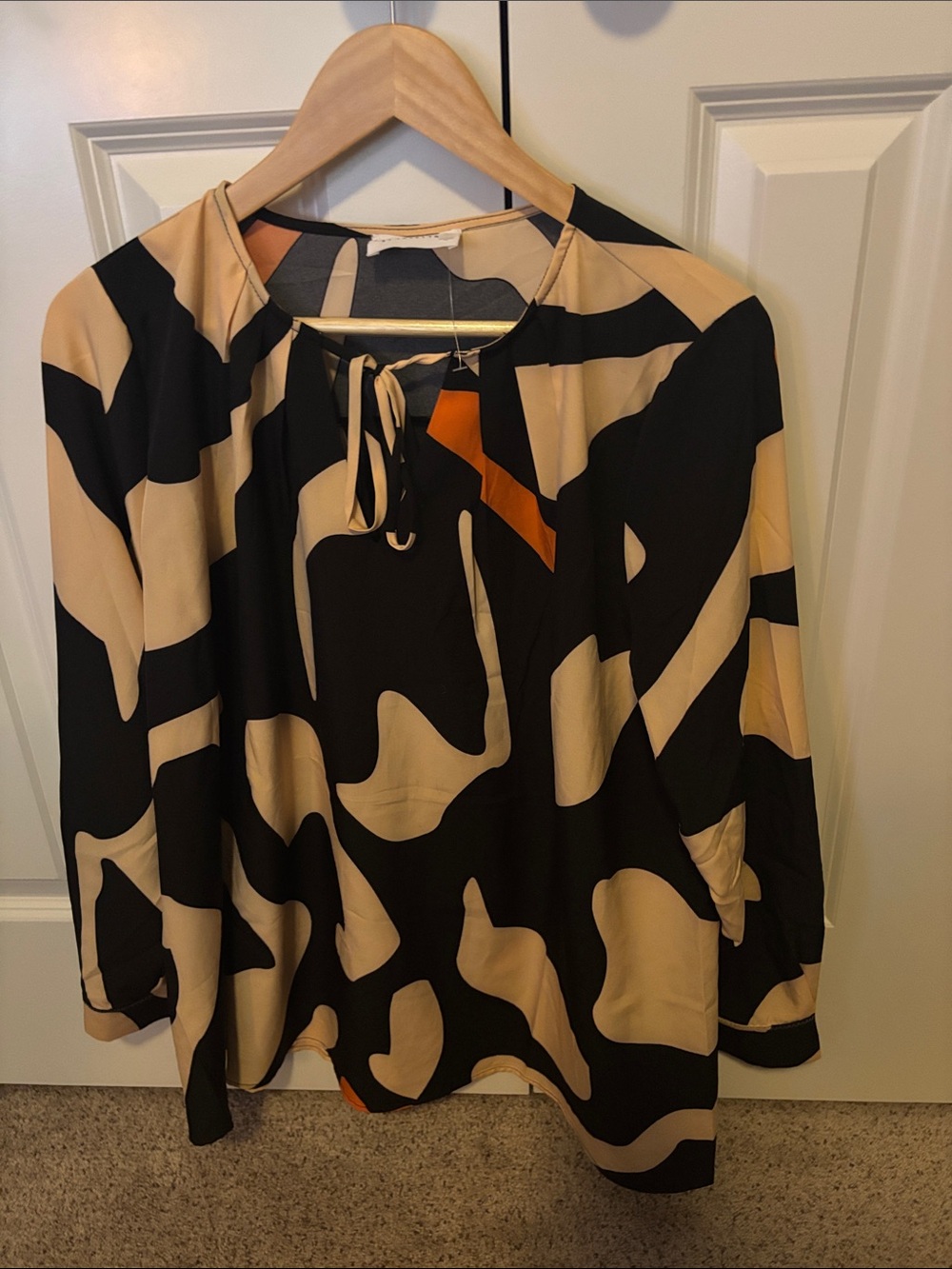 Love Women's Black and Beige Abstract Print Blouse with Orange Accent